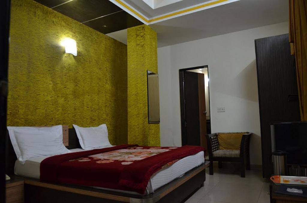 Hotel Durga International New Delhi Værelse billede